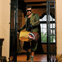 SPRAYGROUND® DUFFLE GOLDEN DYNASTY DUFFLE